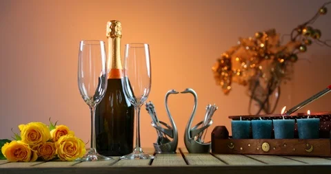 Romantic candle light dinner. Hand with lighter burns candles. Stock-Footage 91880412
