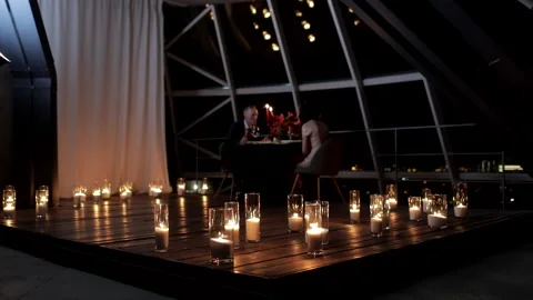Romantic candlelight dinner in a restaurant Stock Footage 235888691
