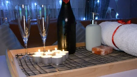 Romantic composition with two glasses for wine and candles. St.Valentine’s Day b Stock Footage 101759896