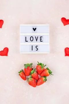 Romantic concept composition with strawberries Stock Photos
