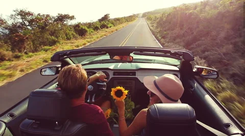Romantic Convertible Drive into Sunset Stock Footage 53349047