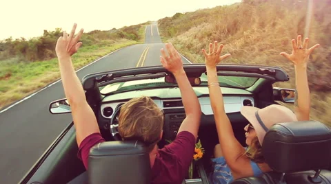 Romantic Convertible Drive into Sunset Stock Footage 53358361