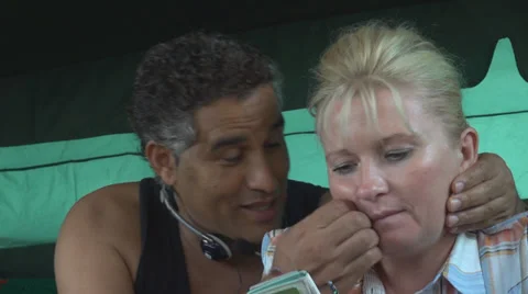 Romantic couple arguing laughing iphone playing blonde woman african man fight  Stock Footage 27963587