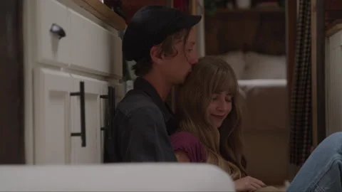 Romantic Couple Cuddling In Their Tiny Home Video stock 219592035