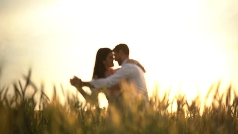 Romantic Couple Dancing at gold wheat flied Stock Footage 94334360
