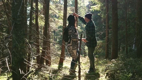 Romantic couple dancing salsa in mountains. Bachata. Sun rays in the forest.  動画素材 120239086