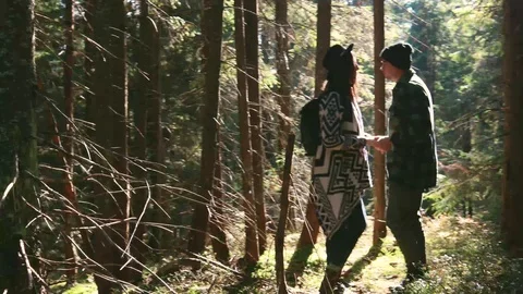 Romantic couple dancing salsa in mountains. Bachata. Sun rays in the forest.  動画素材 120239088