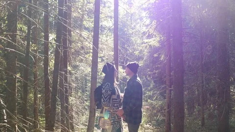 Romantic couple dancing salsa in mountains. Bachata. Sun rays in the forest.  動画素材 120239102