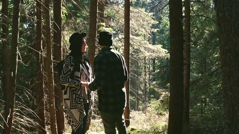 Romantic couple dancing salsa in mountains. Bachata. Sun rays in the forest.  動画素材 120239104