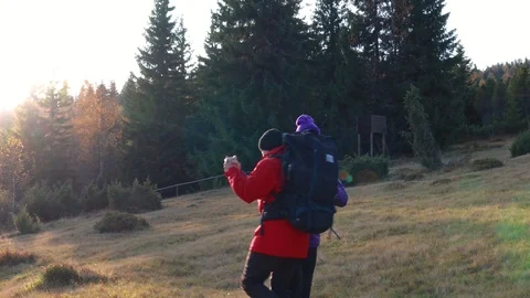 Romantic couple dancing salsa in mountains. Bachata.Hiking. Trekking. Sun ray 動画素材 120239112