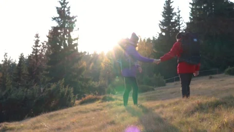 Romantic couple dancing salsa in mountains. Bachata.Hiking. Trekking. Sun ray 動画素材 120239129