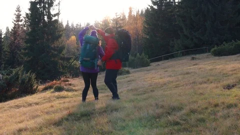 Romantic couple dancing salsa in mountains. Bachata.Hiking. Trekking. Sun ray 動画素材 120239141