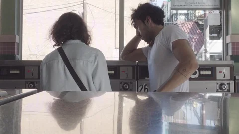 Romantic Couple Do Laundry Together Stock Footage 94386960