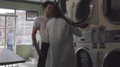 Romantic Couple Do Laundry Together 2 Stock Footage 94387007