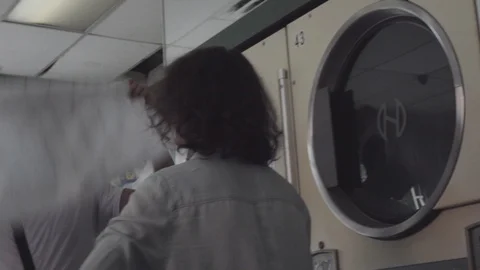 Romantic Couple Do Laundry Together 3 Stock Footage 94387040