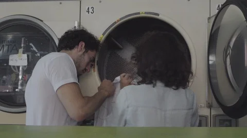 Romantic Couple Do Laundry Together 4 Stock Footage 94387100