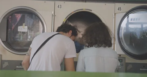 Romantic Couple Do Laundry Together 9 Stock Footage 94407732