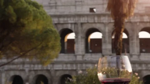 Romantic couple drinking and toasting with cup of red wine sitting at restaurant Stock Footage 84808199