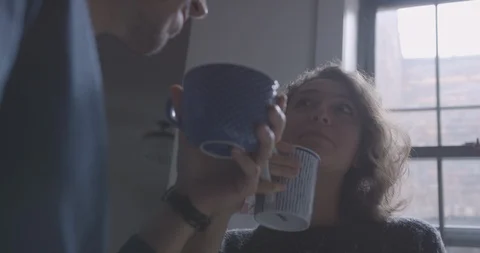 Romantic Couple Drinking Coffee and Laughing Stock Footage 94405079
