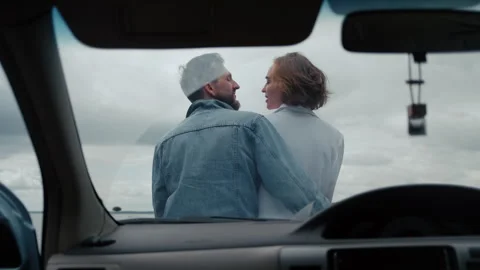 Romantic couple embracing and talking by the sea Stock Footage 328558493