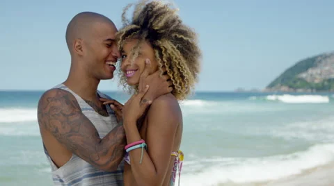 Romantic couple embracing on beach Stock-Footage 49611630
