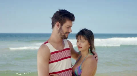 Romantic couple embracing on beach Stock Footage 49614219