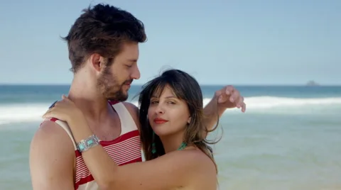 Romantic couple embracing on beach Stock-Footage 49614678