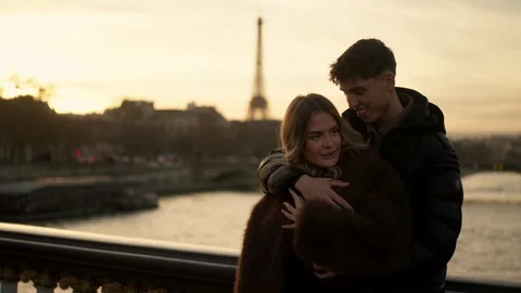Romantic couple embracing with Eiffel Tower view in Paris France at sunset Love Stock Footage 325262831