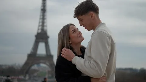 Romantic Couple Embracing With Eiffel Tower In Paris France Young Lovers Stock Photos