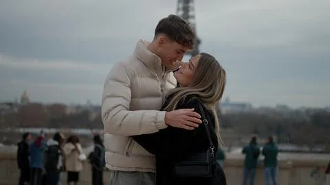 Romantic Couple Embracing With Eiffel Tower In Paris France Young Man And Wom Stock Photos