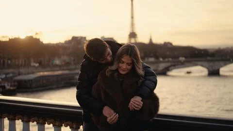 Romantic Couple Embracing With Eiffel Tower View In Paris France At Sunset Fo Stock Photos