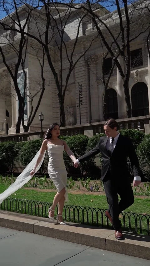 Romantic Couple Embracing One Another in a Charming City Park Wedding Setting 動画素材 291614760