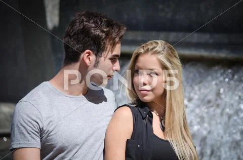 Romantic couple in front of big fountain Stock Photos