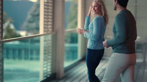 The romantic couple going out on the terrace . slow motion Stock Footage 167735341