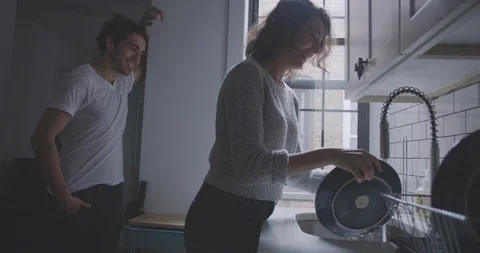 Romantic Couple Have Fun in Kitchen Stock Footage 94448001