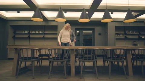 The romantic couple having a date at the empty restaurant Stock Footage 168701111