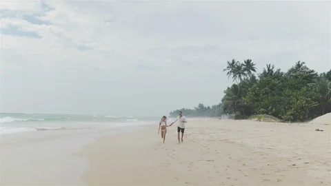 Romantic couple having fun on the beach Stock-Footage 109422123
