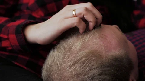 Romantic couple having a great time together in the couch at home Stock Footage 97055987