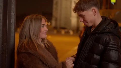 Romantic Couple Holding Hands in Paris at Night Arc de Triomphe Background Young Stock Footage 325248317