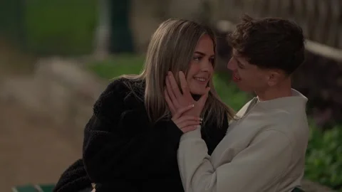 Romantic couple holding hands in Paris France Young lovers in an intimate moment Stock Footage 328572541