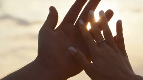 Romantic Couple Holding Hands at Sunset Stock Footage 346026770