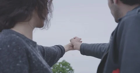 Romantic Couple Intertwining Hands 3 Stock Footage 94403714