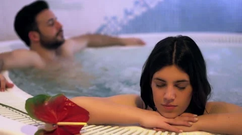 Romantic couple in Jacuzzi. Stock Footage 63371019