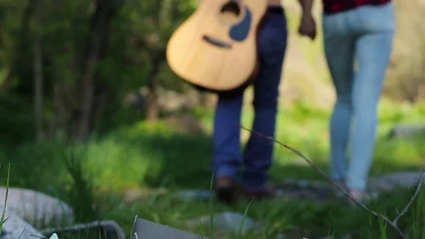 Romantic couple leaving a garbage dump in the forest Slow motion, beautiful Stock Footage 76009299