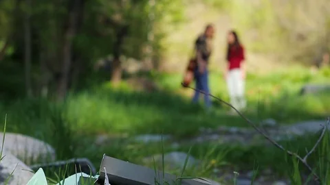 Romantic couple leaving a garbage dump in the forest Slow motion, beautiful 動画素材 76009304