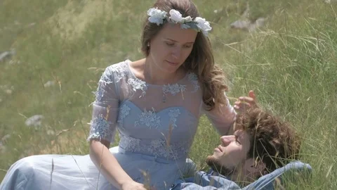 Romantic  couple lie on the grass Stock Footage 93688700