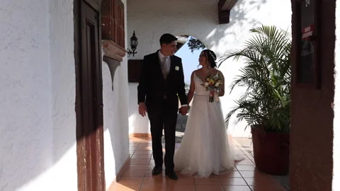 Romantic couple looking at each other while celebrating their big day Video stock 235124877