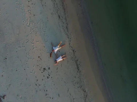 Romantic couple is lying on the beach Stock-Footage 80296857