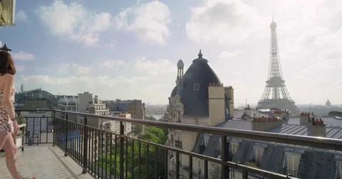 Romantic couple in Paris Eiffel Tower embrace kissing honeymoon enjoying Stock Footage 73351276