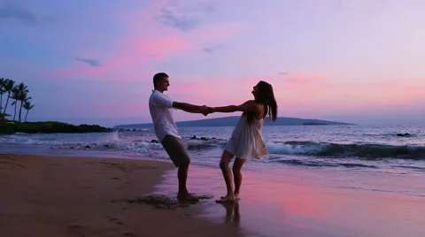 Romantic Couple Playing on Beach Stock Footage 52552365